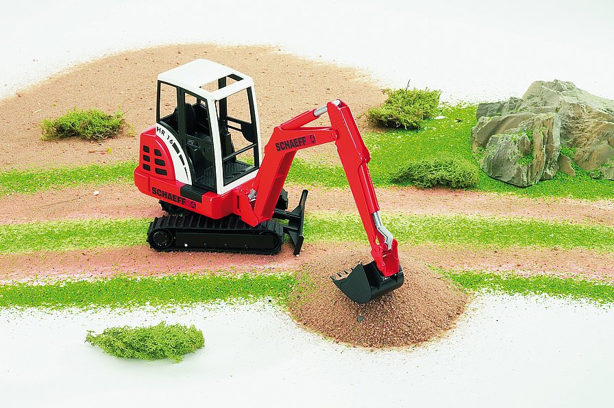 BRUDER MINI EXCAVATOR